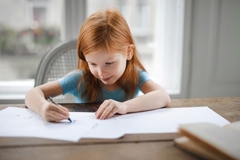 Indoor Air Quality HVAC - child sitting at desk - image