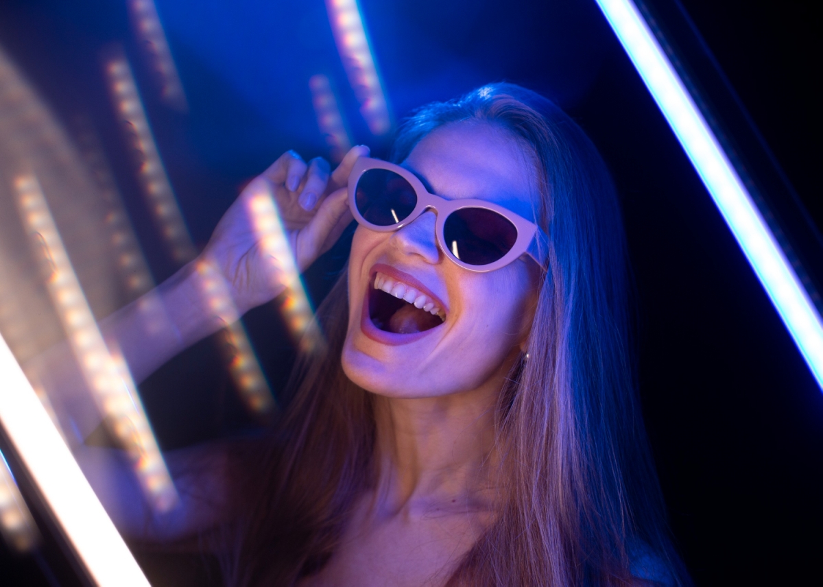 Image - Woman basks in UV lights